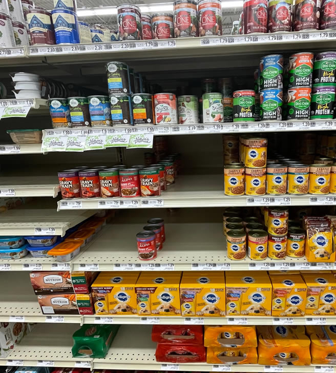Supermarket shelves of meat-based dog food looking very bare!